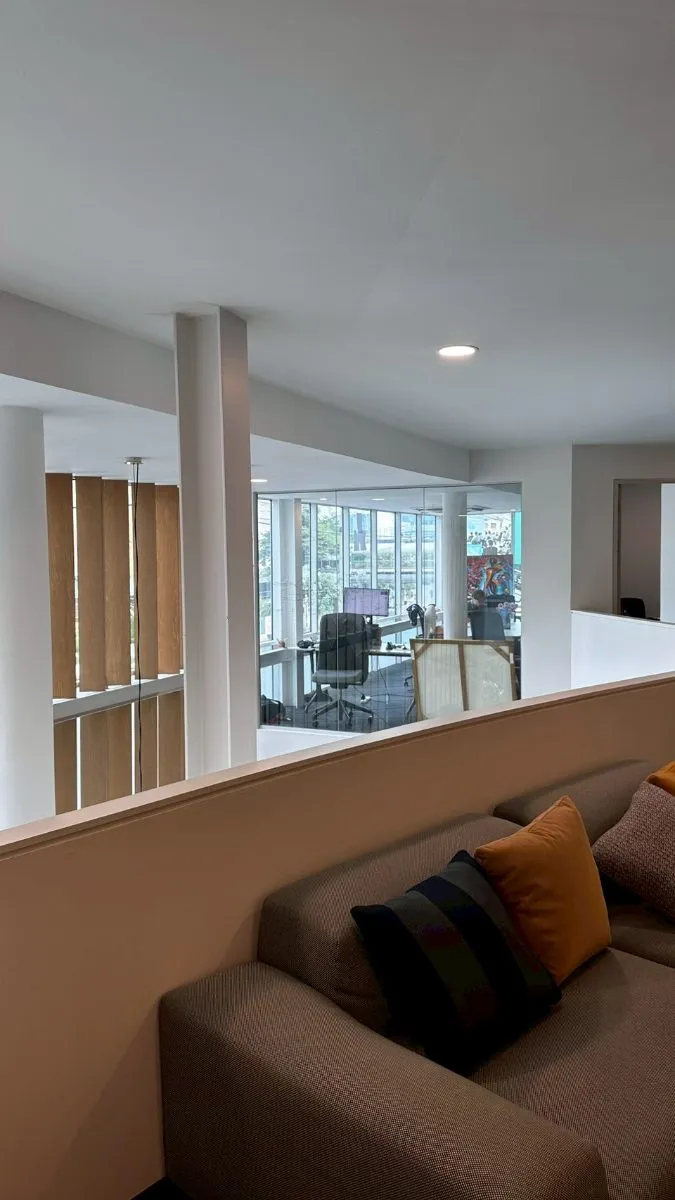 Lounge seating overlooking a private office